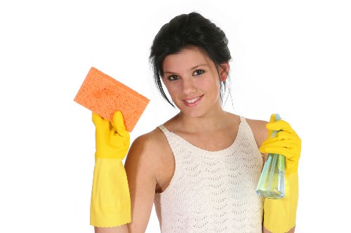 Spot cleaning a mattress stain with careful fabric-safe treatment