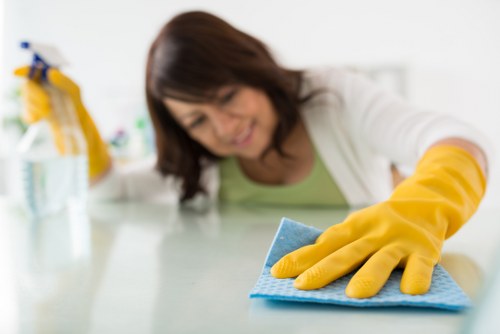 Local team cleaning a hard floor in a commercial Hounslow space